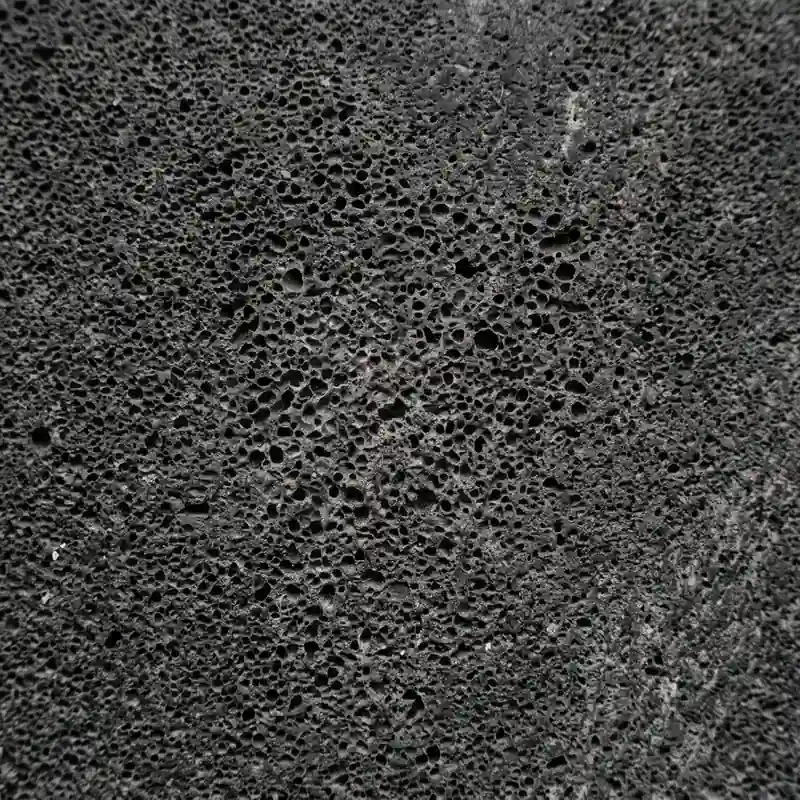 Close-up of dark volcanic basalt lavastone surface texture
