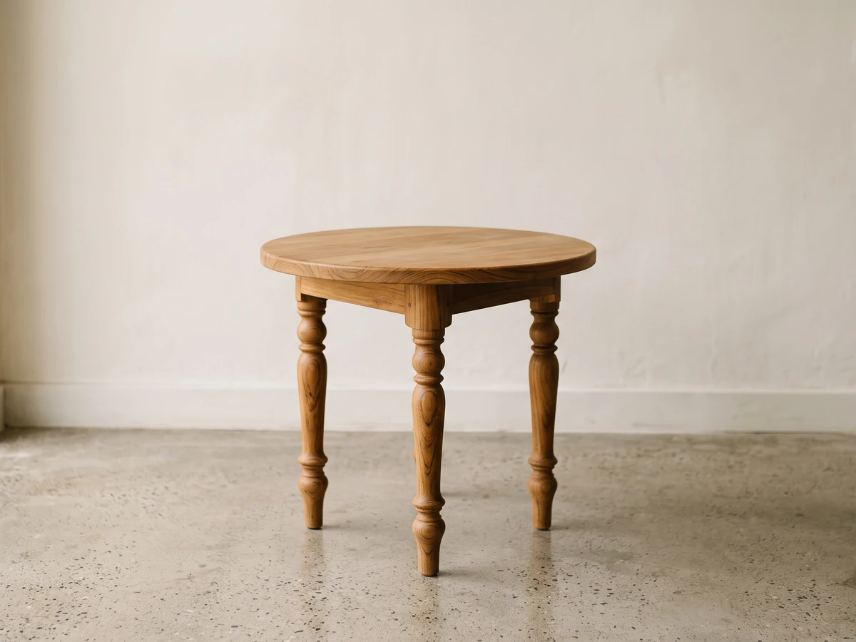 Round teak side table with turned legs, wholesale from Bali