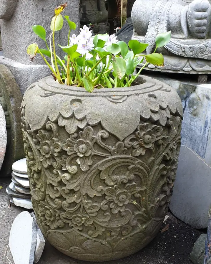 Hand-carved stone planter with floral relief, Bali garden decor sourced by ExportBali