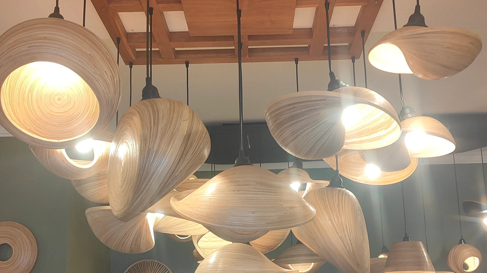 Handmade pendant lamps in a Bali home decor showroom, sourced by ExportBali