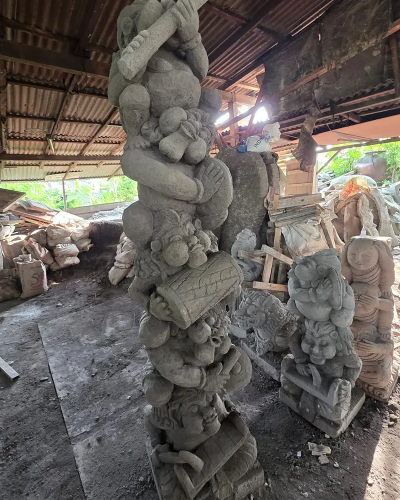 Carved stone garden statues in a Bali carving workshop