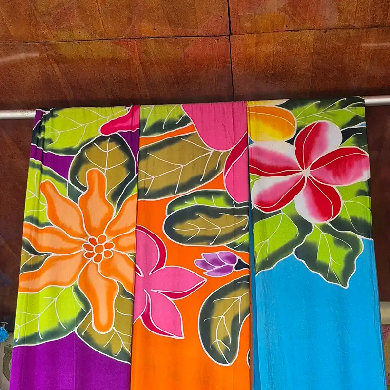 Hand-painted sarongs with floral patterns, Bali textile detail