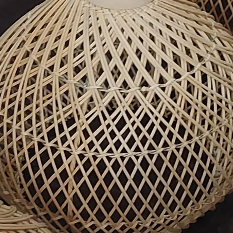 Close-up of a hand-woven rattan pendant lamp shade from Bali