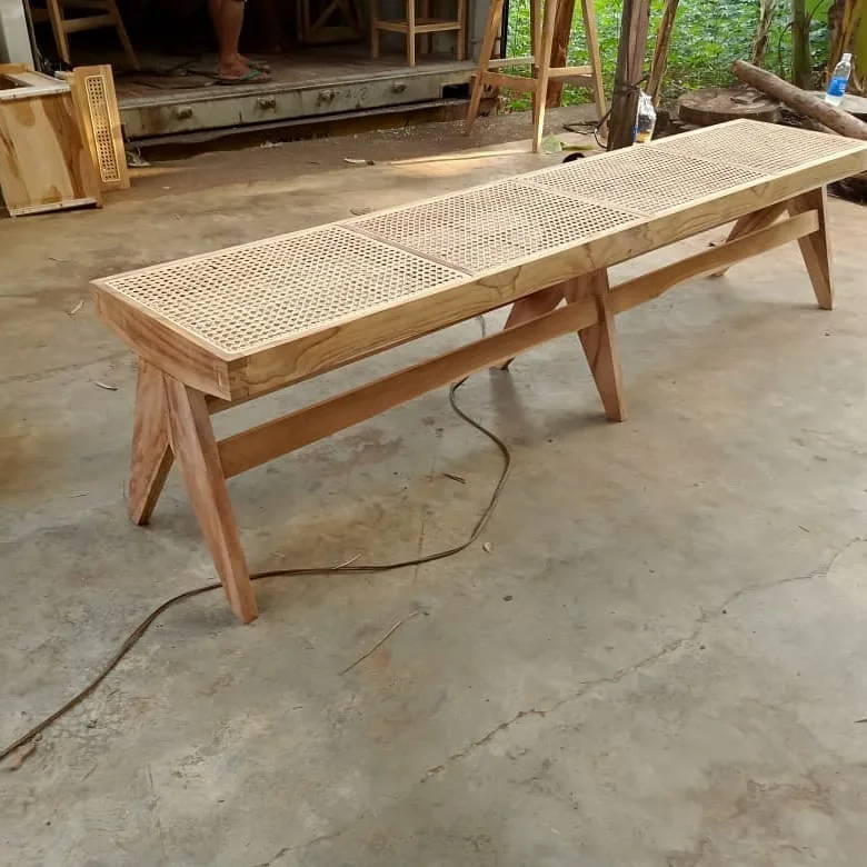 Teak bench with a woven rattan cane seat, made in Bali